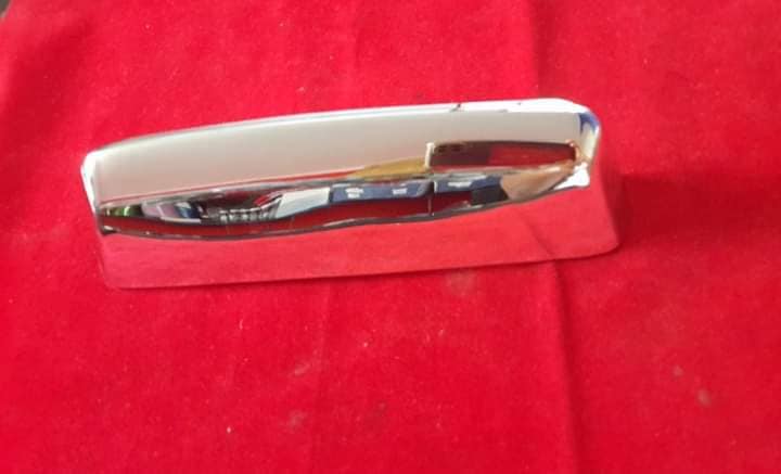 Rear number plate light hood