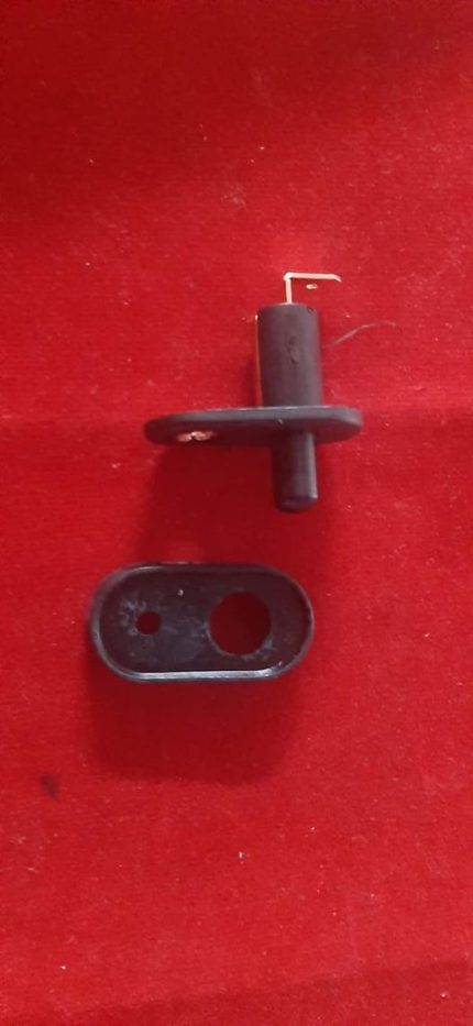 Door light switch with rubber boot to prevent water leaks